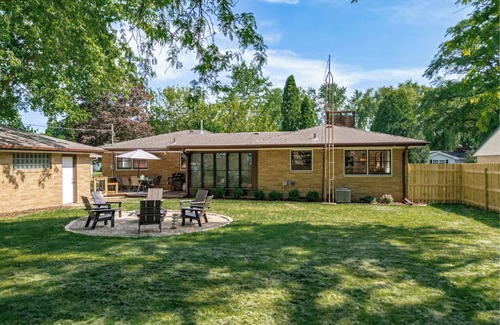 Janesville House | Entertainment Haven! Firepit, Game Room, and Large fenced-in yard