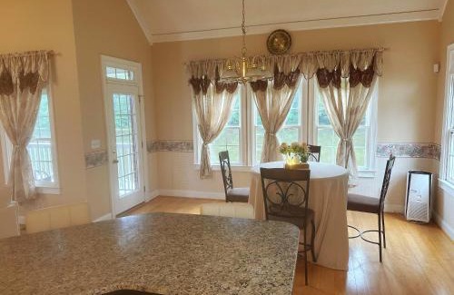 Conyers Apartment | Entire 4BR Lakeview Home with Parking Fast Wi-Fi Conyers