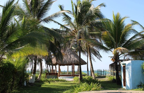 San Bernardo del Viento Cabin | Entire home in a tropical nature beach paradise directly on the Caribbean sea.