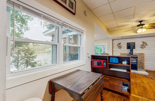 Augusta Cabin | Entire lakefront home on Togus Pond with decks, canoe, firepit & great view