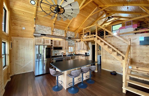 Williamstown Cabin | Epic Family Lake Getaway - 5 Min to Ark, Gameroom, 100ft Dock, Hot Tub, Sauna
