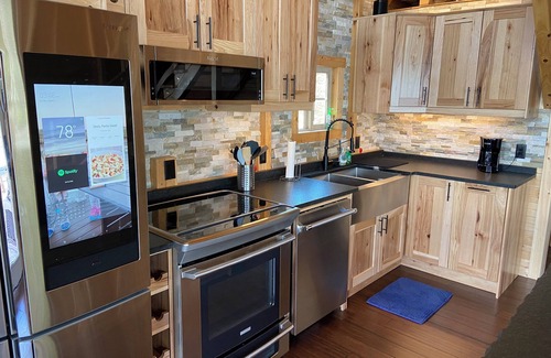 Williamstown Cabin | Epic Family Lake Getaway - 5 Min to Ark, Gameroom, 100ft Dock, Hot Tub, Sauna