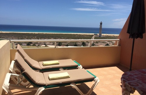 Solana del Matorral Apartment | Cozy and romantic apartment overlooking the beach, terrace, Wifi