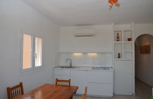 Es Pujols Apartment | Es Pujols: Bright apartment just steps from the beach, Free WiFi.