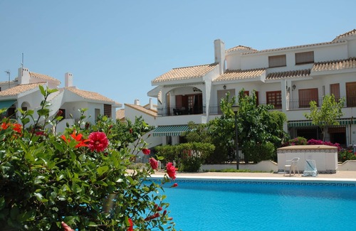 Torre de la Horadada House | Cozy Bungalow with terrace overlooking swimming pool.