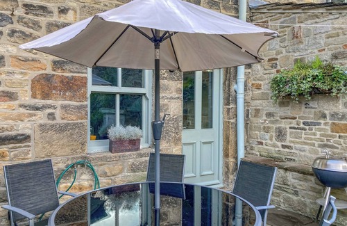 Addingham Cottage | Escape to a charming Addingham retreat featuring a private hot tub.
