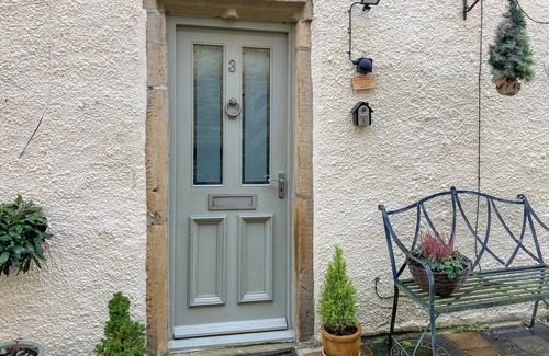 Addingham Cottage | Escape to a charming Addingham retreat featuring a private hot tub.