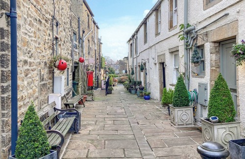 Addingham Cottage | Escape to a charming Addingham retreat featuring a private hot tub.