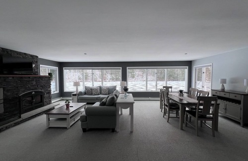 Saugerties South House | Escape to a stunning two-story home nestled on serene Esopus Creek in Saugerties