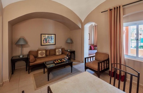 Makadi Bay Resort | Escape to Comfortable Room with Balcony and Pool for Fun Seaside Memories