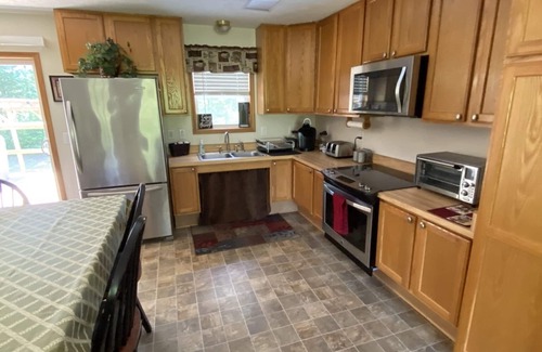 Manistee House | Escape to Northern Michigan! Private, secluded with spa. ORV/snowmobile trail.