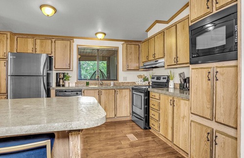 Munds Park Cabin | Escape to Pinewood Canyon Cabin — a cozy 2BR/2BA retreat nestled in the pines of Munds Park. With Inviting interiors, a relaxing deck, and direct forest access, it’s the perfect basecamp for year-round adventure and mountain serenity.