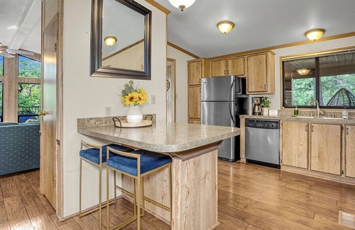 Munds Park Cabin | Escape to Pinewood Canyon Cabin — a cozy 2BR/2BA retreat nestled in the pines of Munds Park. With Inviting interiors, a relaxing deck, and direct forest access, it’s the perfect basecamp for year-round adventure and mountain serenity.