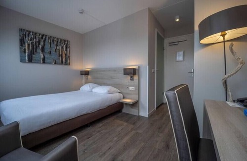 Westkapelle Hotel | Escape to the Beach: Outdoor Pool, Tennis, Free Parking & Outdoor Activities