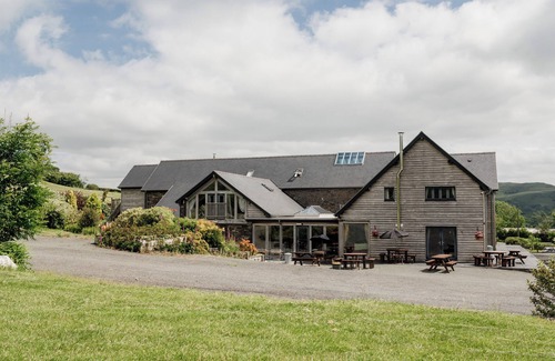 Devils Bridge House | Escape to the heart of the Welsh countryside at this beautifully renovated luxury barn. Perfect for families, groups, and corporate retreats.