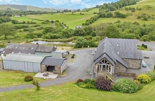 Devils Bridge House | Escape to the heart of the Welsh countryside at this beautifully renovated luxury barn. Perfect for families, groups, and corporate retreats.