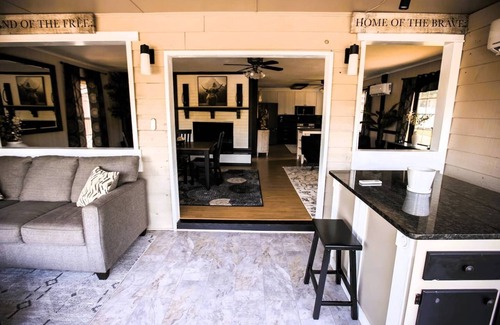 Cave Spring House | Escape to Tranquil Waters, where comfort meets calm. Enjoy serene river views and waterfront access, inviting spaces, and the perfect backdrop for rest, romance, or family fun. Boat Rental and Fishing Charters available anytime of the year.