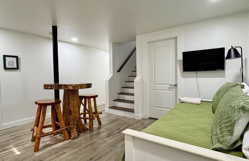 Stone Mountain House | EV Charger - 2 King Suites - Game Room - Office Space - Basement Apartment