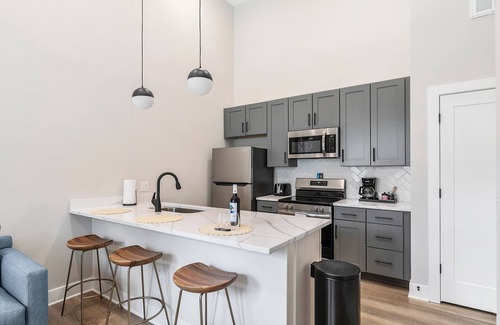 Forest Hill Terrace Apartment | Evelyn 102 - A Cozy 1BR with 16ft Ceilings in Charming Forest Hill