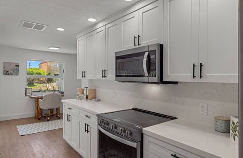 Shell Harbor House | Exceptional canal front home, beautiful design, steps to beach!