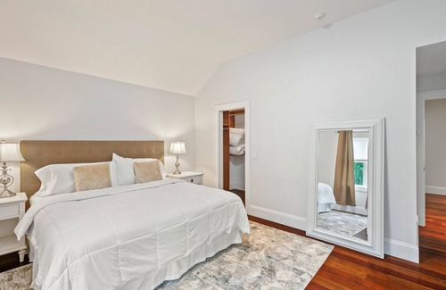 Wainscott Woods House | Exceptional shingle-style home sited on just under an acre of land,.