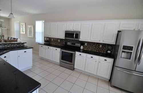 Haines City Villa | Exceptional Villa Large Private South Facing Pool/Spa Games & Exercise Room