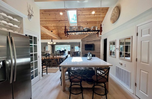 Powers Lake Villa | EXCLUSIVE LAKEFRONT with beach, beach house, piers, trampoline + sister villa