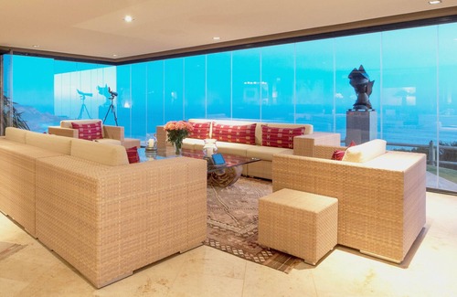 Knysna Villa | Exclusive, Luxurious Villa perched above cliffs with indoor pool & ocean views.