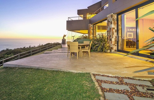 Knysna Villa | Exclusive, Luxurious Villa perched above cliffs with indoor pool & ocean views.