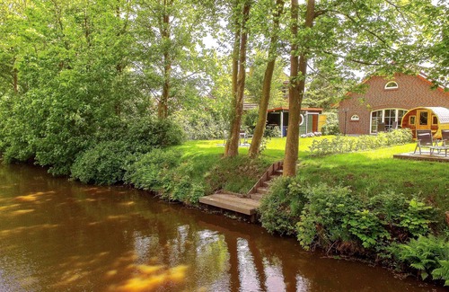 Hage House | Exclusive luxury vacation home right on the water with 5 stars in East Frisian Amb