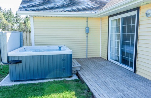 Stanley Bridge Condo | Executive suite with outdoor hot tub and fire pit | Golf View, close to pool