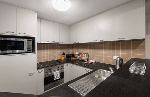 Chinatown Apartment | Executive Urban Living with Balcony and Heated Pool