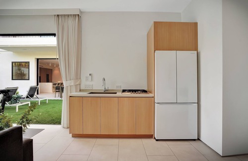 Beverly Grove House | Expansive 6-bedroom residence in prime West Hollywood, bright open living,