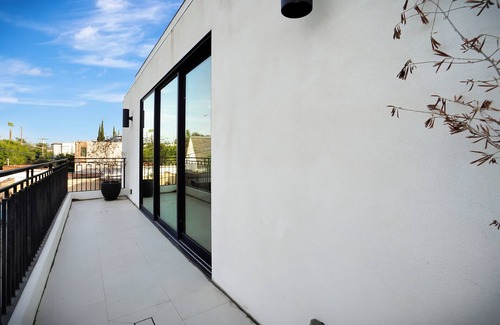 Beverly Grove House | Expansive 6-bedroom residence in prime West Hollywood, bright open living,