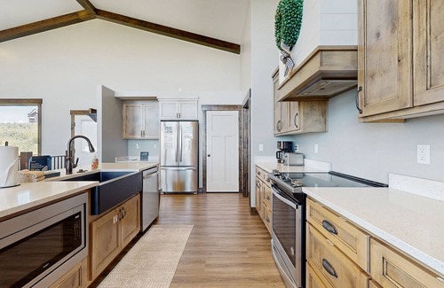 Sweetwater House | Expansive lake house with sweeping views and access to Ideal Beach Resort