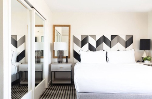 Norma Triangle Hotel | Experience a Luxurious Stay with Rooftop Heated Pool! Four Units, Pet-friendly!