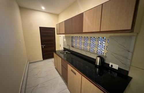 Talipparamba Apartment | Experience Authentic Kerala at Kurinjirappallil