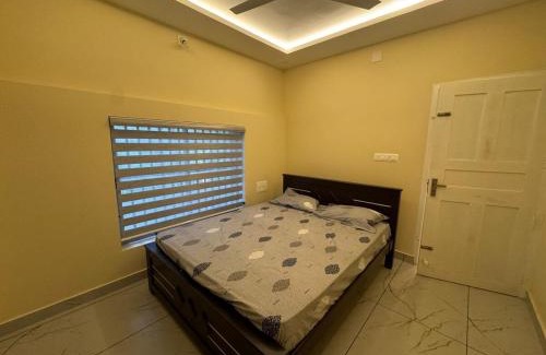 Talipparamba Apartment | Experience Authentic Kerala at Kurinjirappallil
