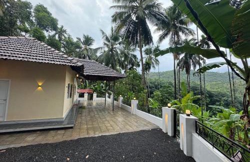 Talipparamba Apartment | Experience Authentic Kerala at Kurinjirappallil
