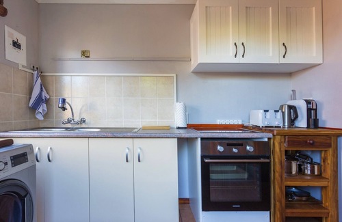 Brenton-on-Sea Apartment | Experience Nature at Brenton on Sea with breakers dolphins and whales
