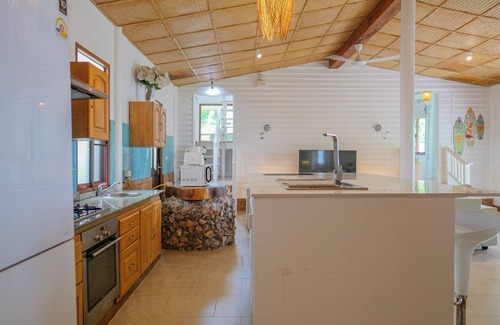 Taling Ngam Villa | Experience serene sunsets, private beach access, and tropical luxury in this renovated Thai house.