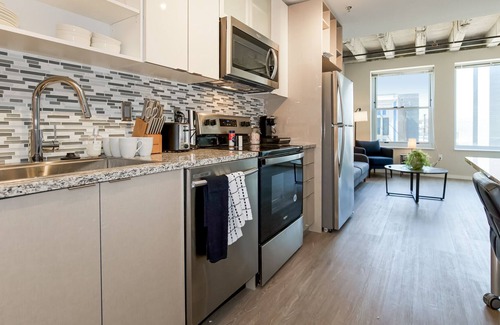 Crossroads Arts District Condo | Experience Serenity in an Elegant Accommodation with a Heavenly Rooftop Haven 31