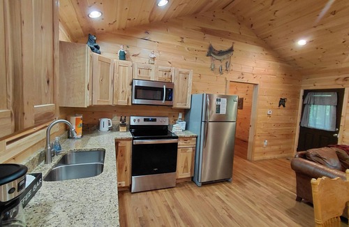 Bryson City House | Experience the charm of Bryson City in this cozy 2-bedroom cabin, Creekside Too.