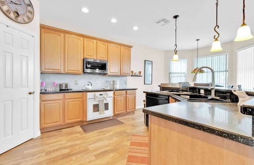 Legacy Park House | Experience the ultimate getaway at our 4-bedroom