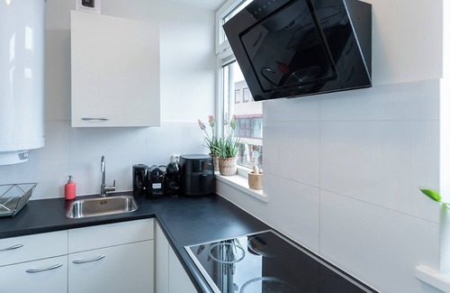 Tilburg House | Experience the Ultimate Convenience in our Cozy Junior suite with free street-parking.