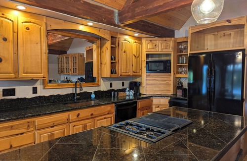 Eatonville House | Experience upscale cabin living at Wolf Lodge our rustic, lakeside retreat!