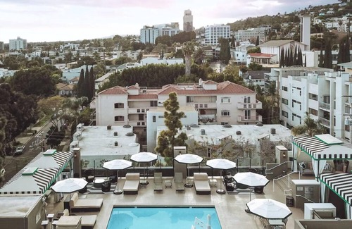 Norma Triangle Hotel | Explore Luxurious Suite with Living Spaces, Private Balconies, Rooftop Pool!