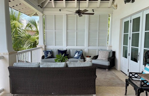 Dunmore Town House | Exquisite Bay front Estate, dockage 100' boat, LG pool, close to town and beach.
