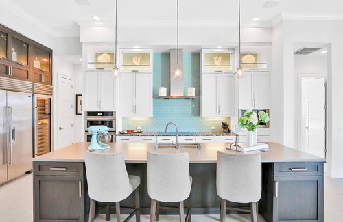 Island Estate House | Exquisite Clearwater Retreat w/Heated Pool, Game Room, Outdoor kitchen &Kayaks