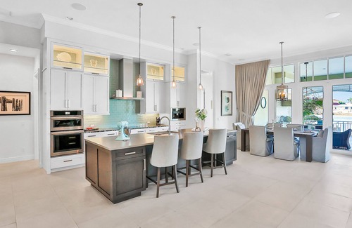 Island Estate House | Exquisite Clearwater Retreat w/Heated Pool, Game Room, Outdoor kitchen &Kayaks